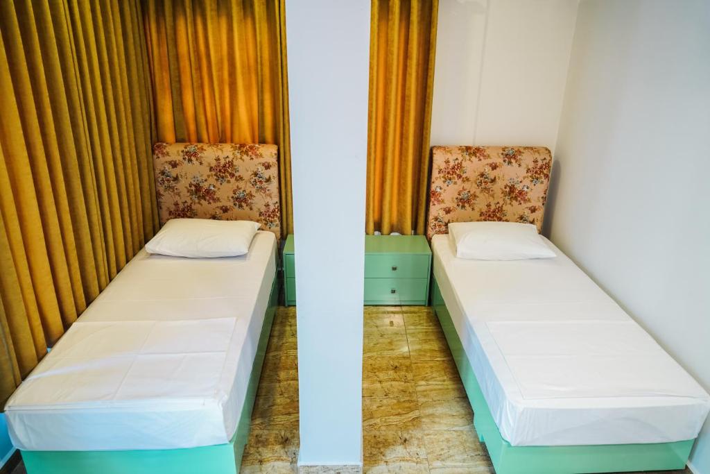 Postel nebo postele na pokoji v ubytování Hotel Magic