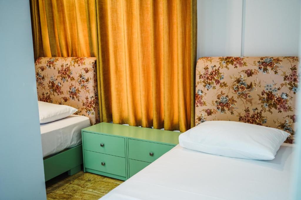 Postel nebo postele na pokoji v ubytování Hotel Magic
