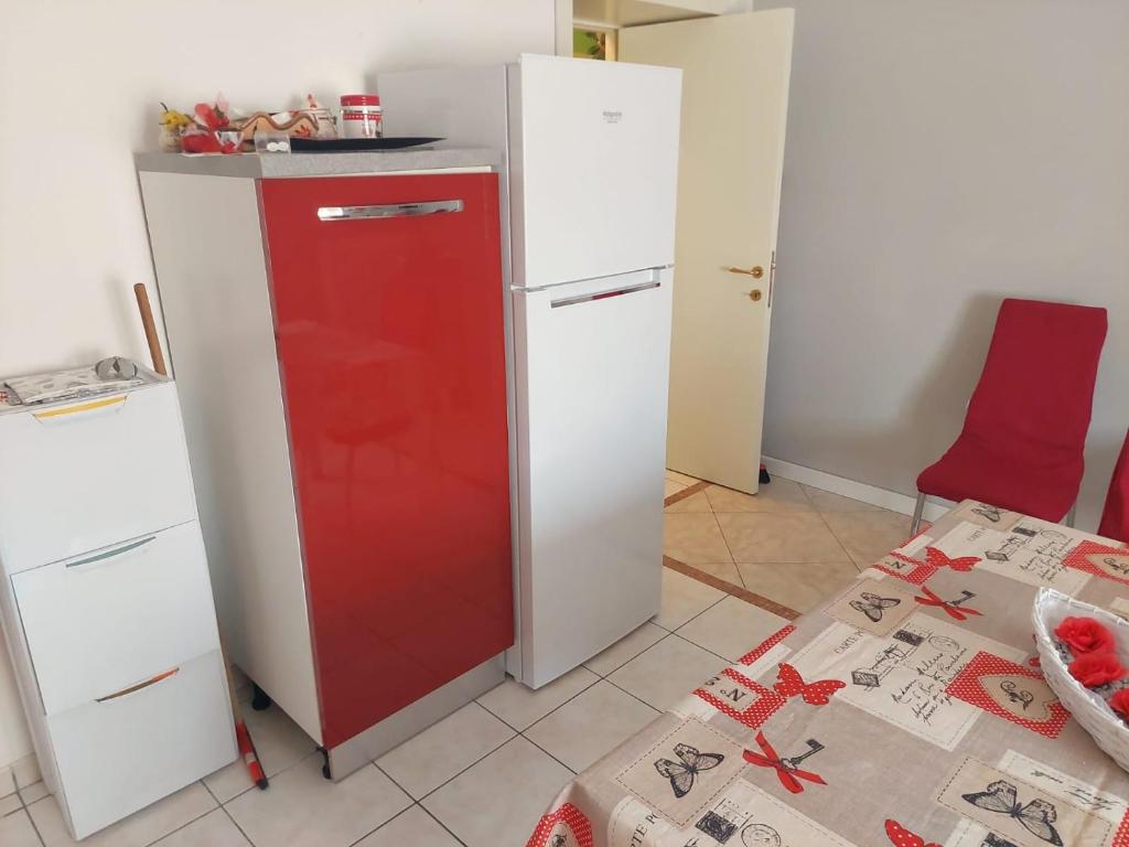 Kuchyň nebo kuchyňský kout v ubytování Casa Vacanze La Piazzz