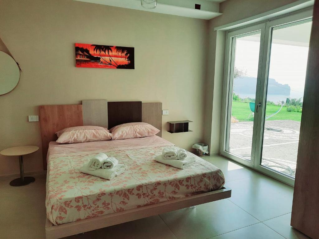 A bed or beds in a room at Gaetammare