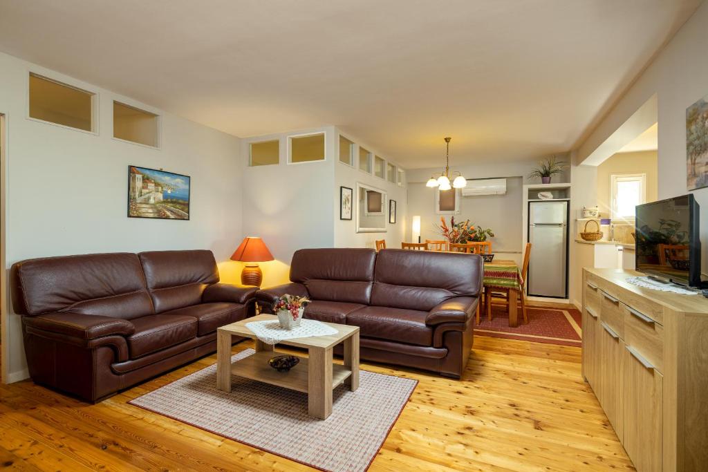 Kuchyňa alebo kuchynka v ubytovaní Beautiful Apartment Goldy