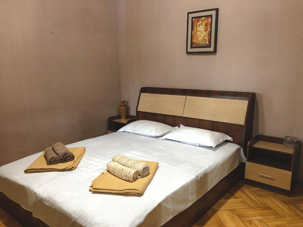 Postel nebo postele na pokoji v ubytování Philia's Guest House