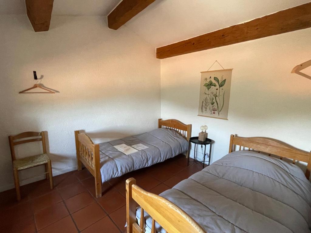 Postel nebo postele na pokoji v ubytování Gîte XL Familles et groupes Duilhac sous Peyrepertuse