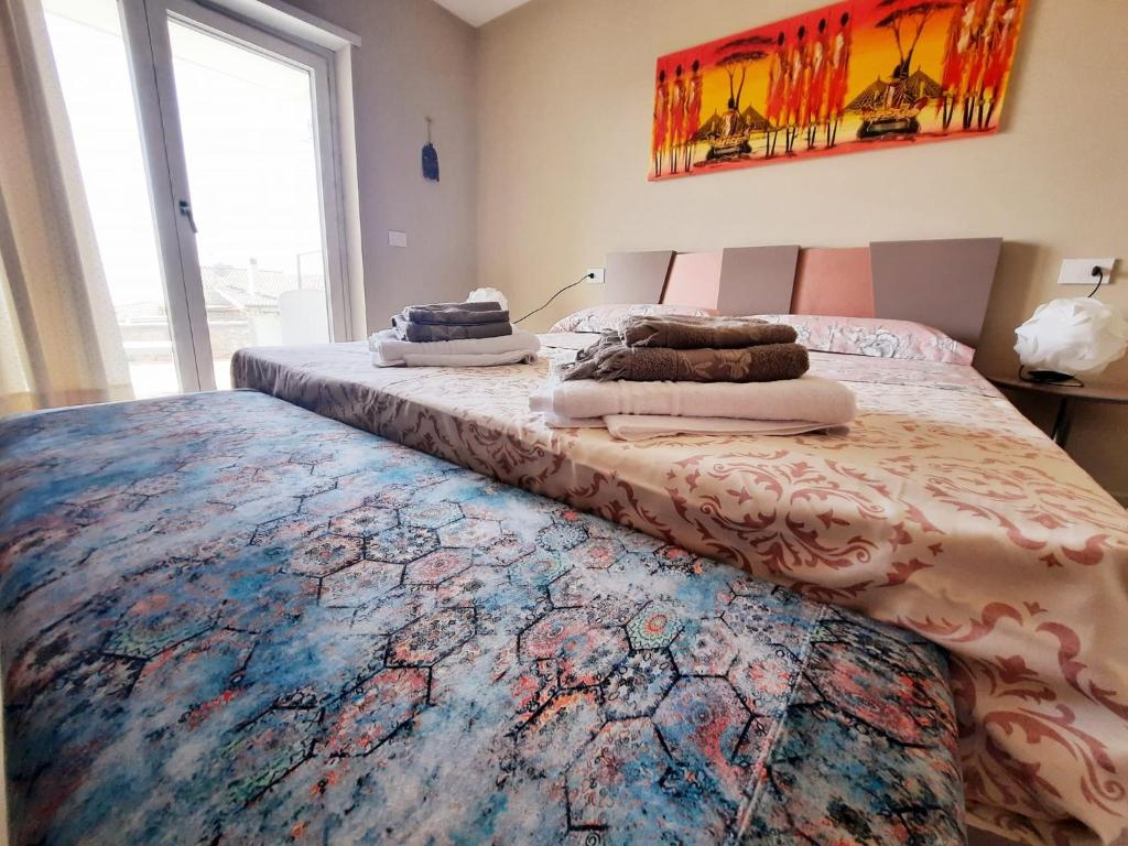 A bed or beds in a room at Gaetammare
