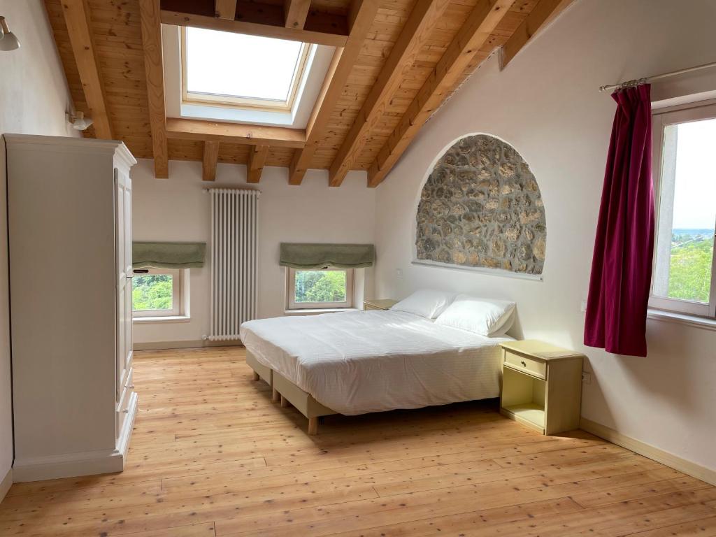 Postel nebo postele na pokoji v ubytování Agriturismo ValBarè