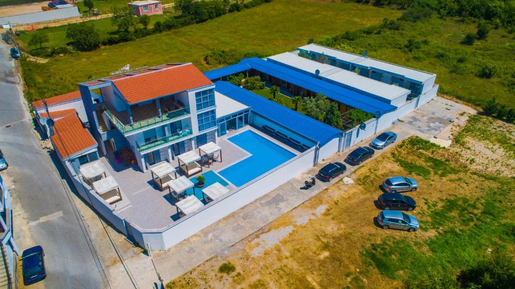an overhead view of a house with a swimming pool at Holiday Park Verse in Ulcinj