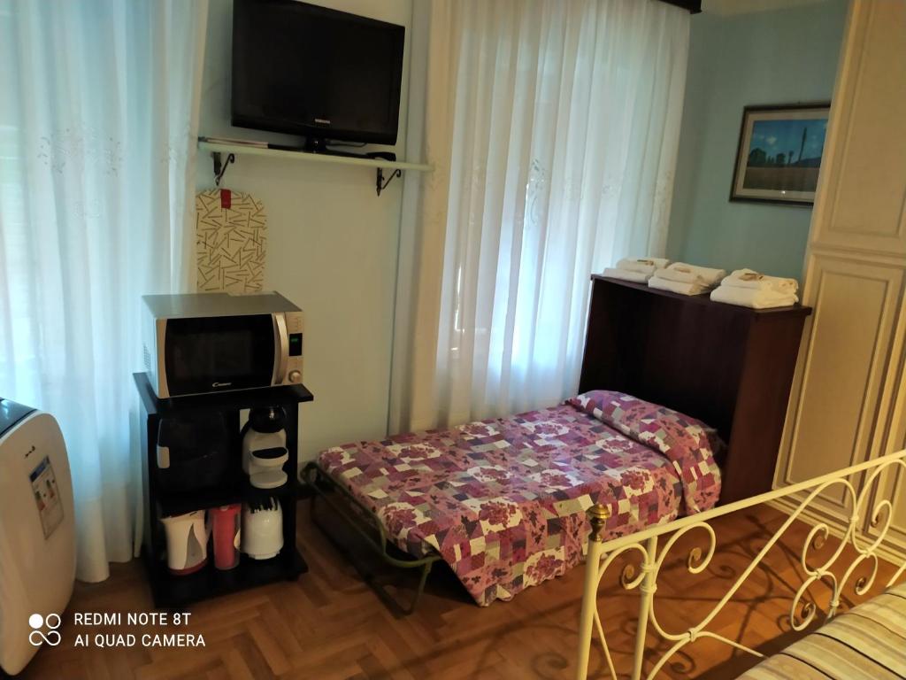 Posteľ alebo postele v izbe v ubytovaní Castelvecchio Alto