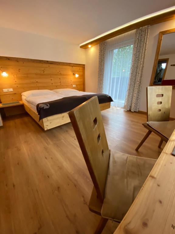 Postel nebo postele na pokoji v ubytování Apart Berghof Steinbock