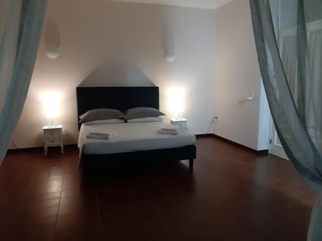 Postel nebo postele na pokoji v ubytování Relais LaValle