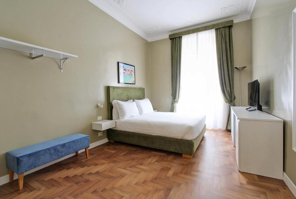 A bed or beds in a room at The river corner