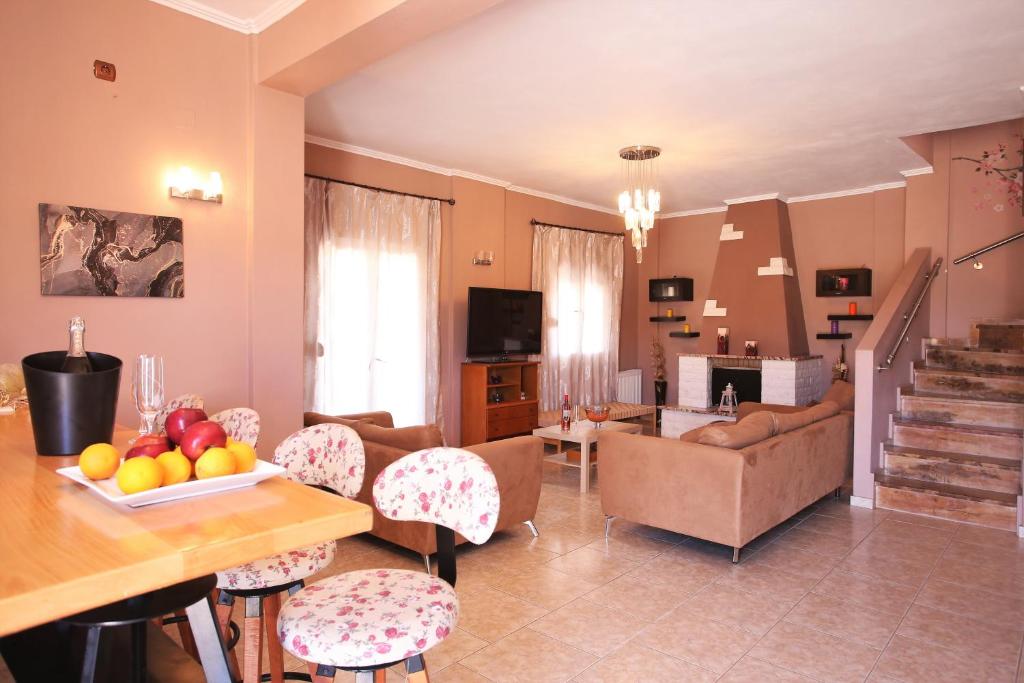 Kuchyň nebo kuchyňský kout v ubytování Alice Maisonette & Studios
