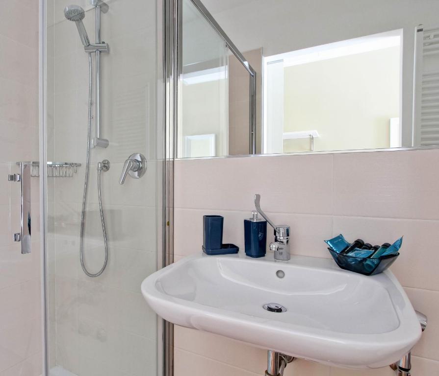 A bathroom at The river corner