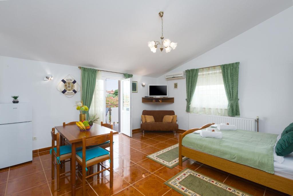 Posteľ alebo postele v izbe v ubytovaní Studio Apartmani Marcela