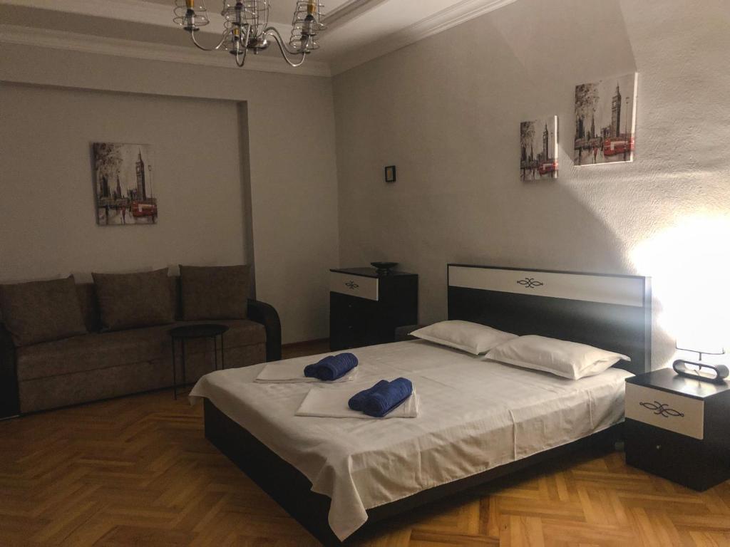 Postel nebo postele na pokoji v ubytování Philia's Guest House