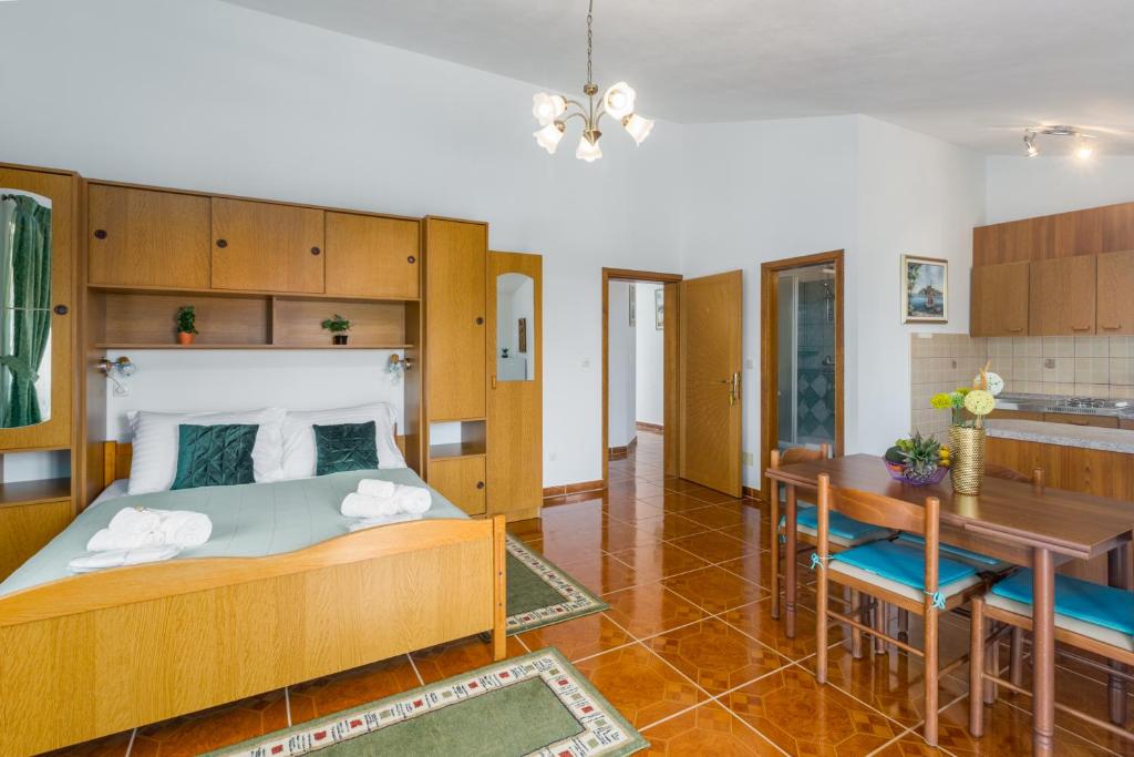 Posteľ alebo postele v izbe v ubytovaní Studio Apartmani Marcela