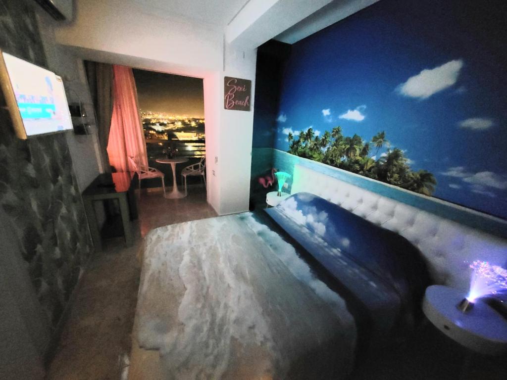 TV a/nebo společenská místnost v ubytování Sexi-Beach