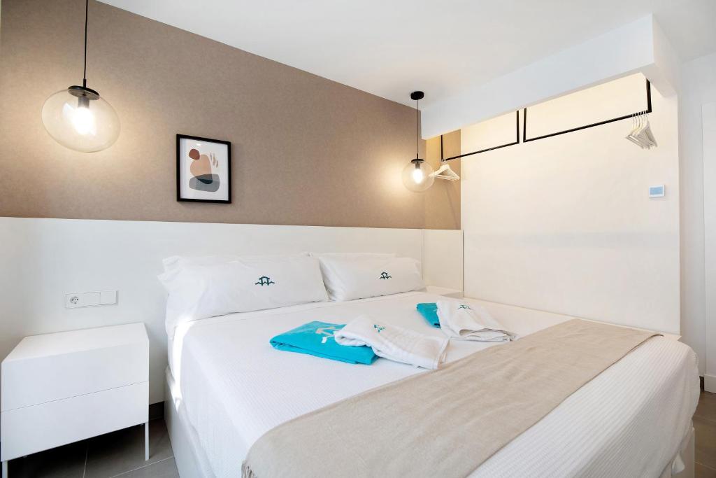 A bed or beds in a room at Andrea Sea Villa
