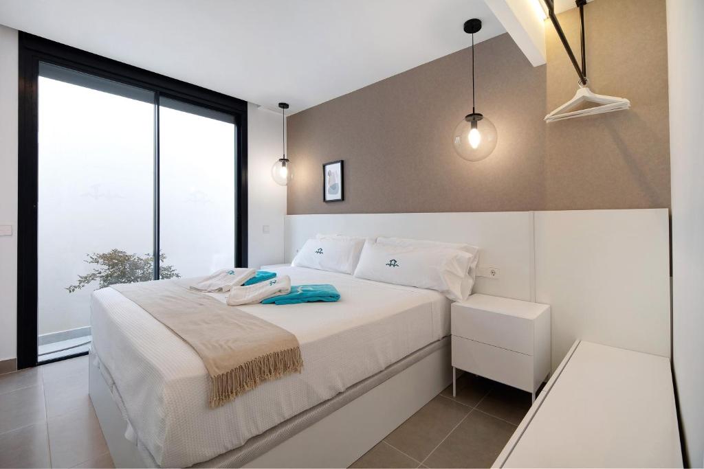 A bed or beds in a room at Andrea Sea Villa