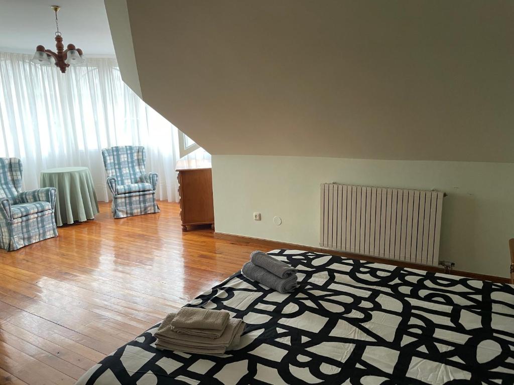 Łóżko lub łóżka w pokoju w obiekcie Ermita San Vicente de la Barquera Duplex