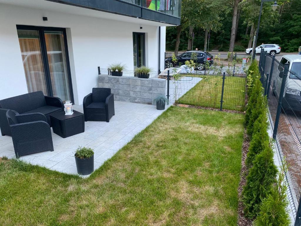 Vonkajšia záhrada v ubytovaní APARTAMENT KRZYŚ