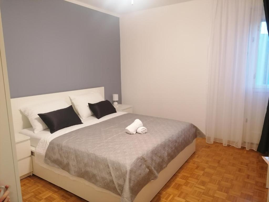 Postel nebo postele na pokoji v ubytování Apartment Karla