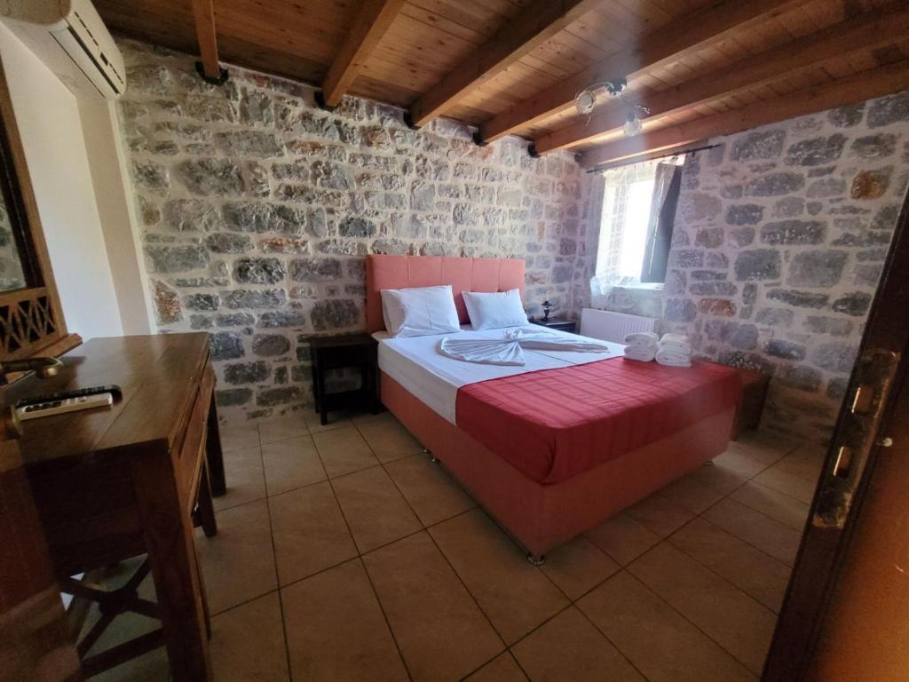 Postel nebo postele na pokoji v ubytování Althea Village