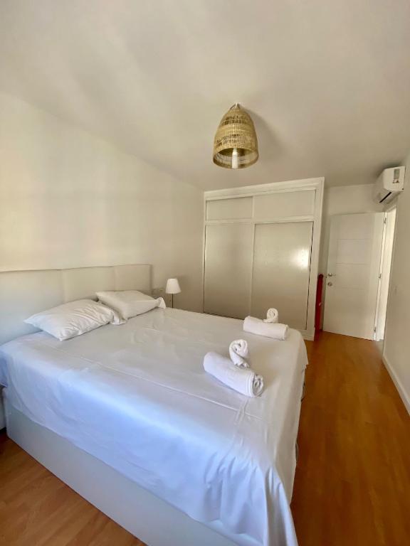 Posteľ alebo postele v izbe v ubytovaní Suite Homes Alamos Terrace