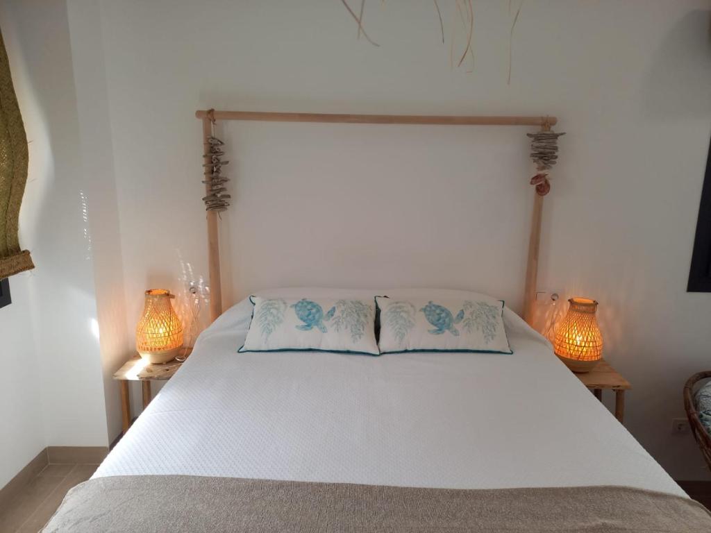 A bed or beds in a room at Mirador de Trafalgar Conil