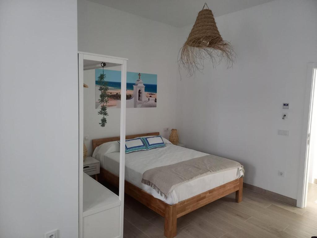 A bed or beds in a room at Mirador de Trafalgar Conil