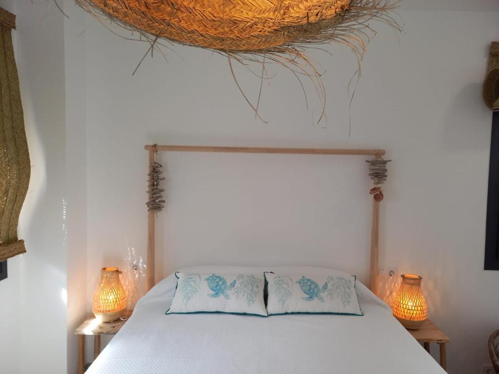 A bed or beds in a room at Mirador de Trafalgar Conil