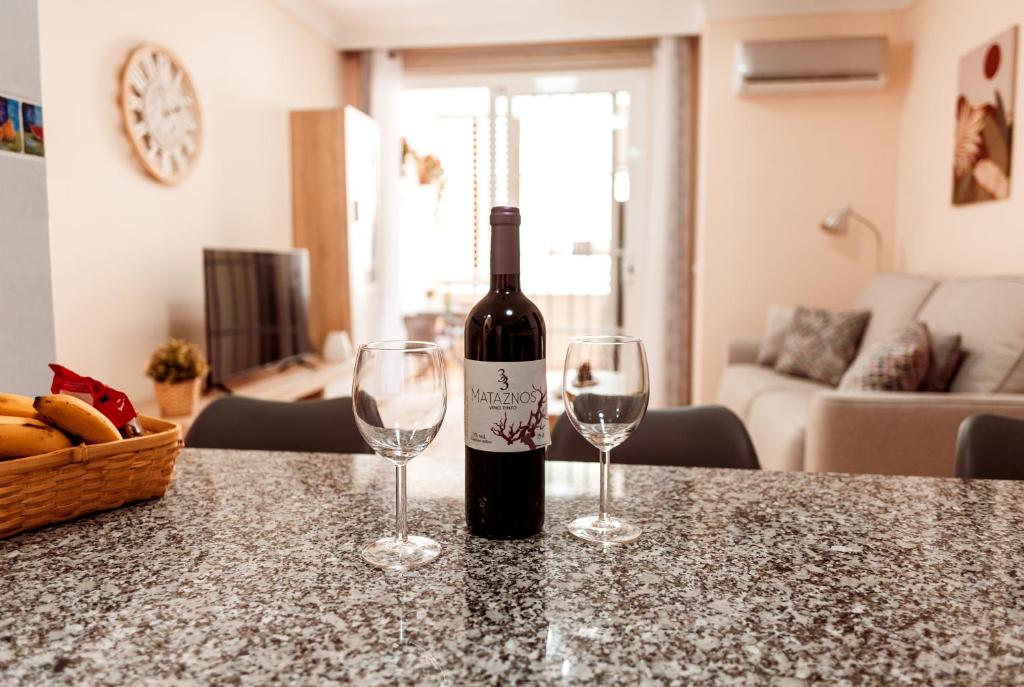 Napoje w obiekcie Apto ACHE, acogedor apartamento de 66 m con terraza, aire acondicionado y parking privado gratuito