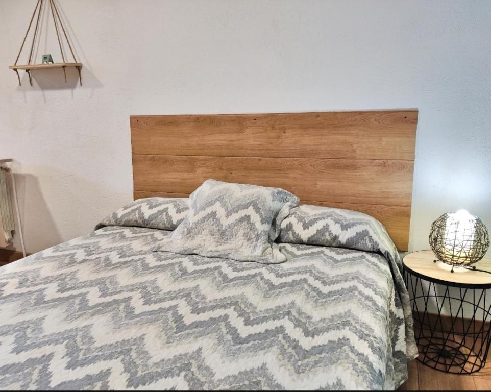 Posteľ alebo postele v izbe v ubytovaní Apartament CORBATERA CIM apartaments