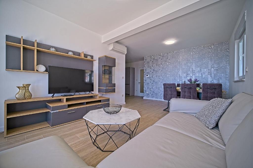 Posteľ alebo postele v izbe v ubytovaní Exclusive Makarska Apartment Aurora
