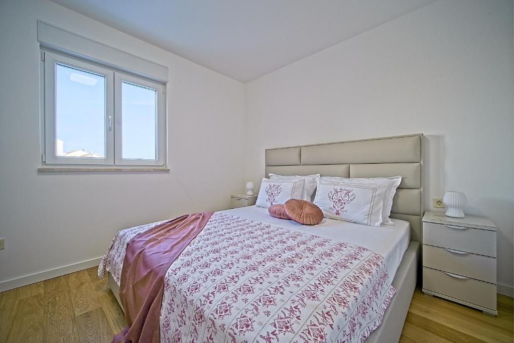 Posteľ alebo postele v izbe v ubytovaní Exclusive Makarska Apartment Aurora