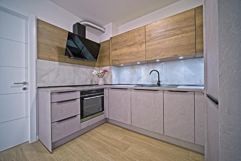 Kuchyňa alebo kuchynka v ubytovaní Exclusive Makarska Apartment Aurora