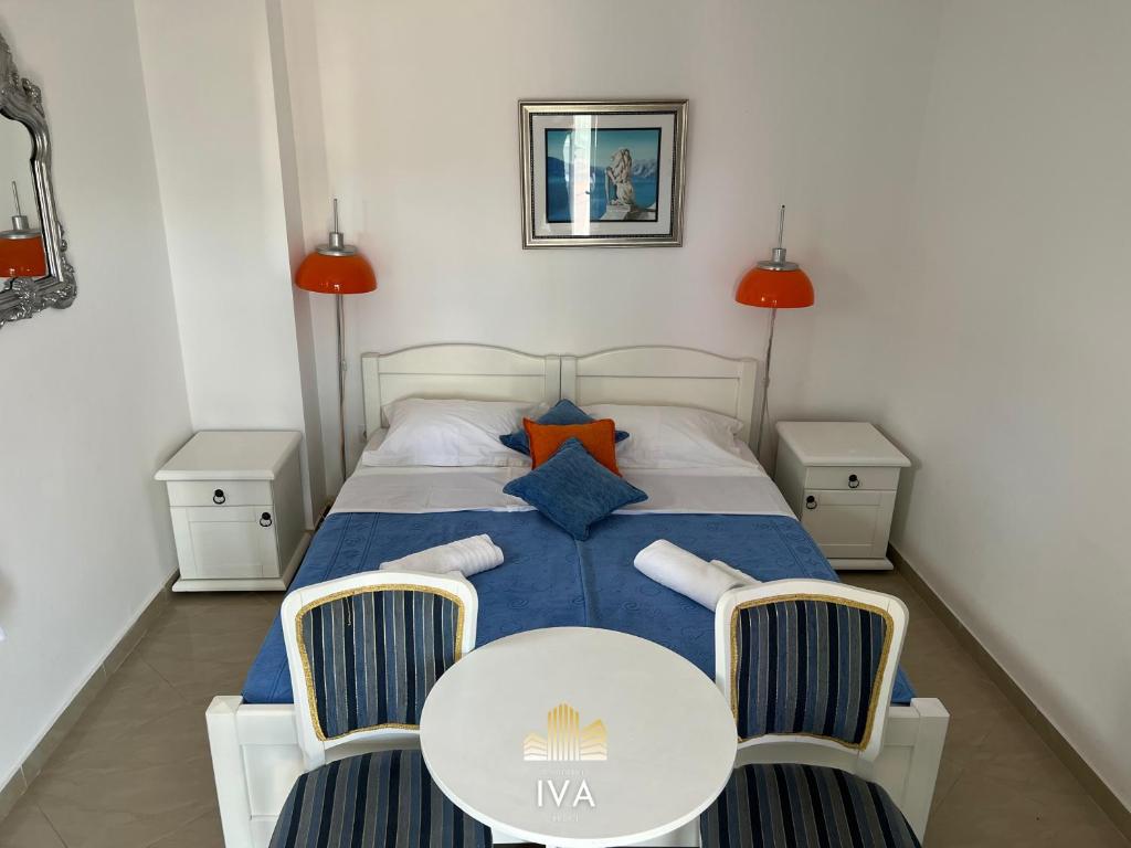 Postel nebo postele na pokoji v ubytování Apartmani IVA Bečići