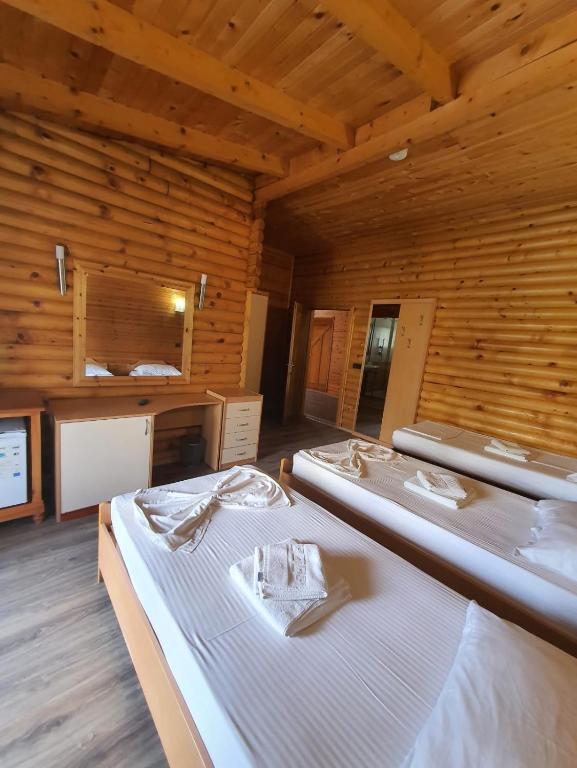 Postel nebo postele na pokoji v ubytování Hotel Adriatik 2
