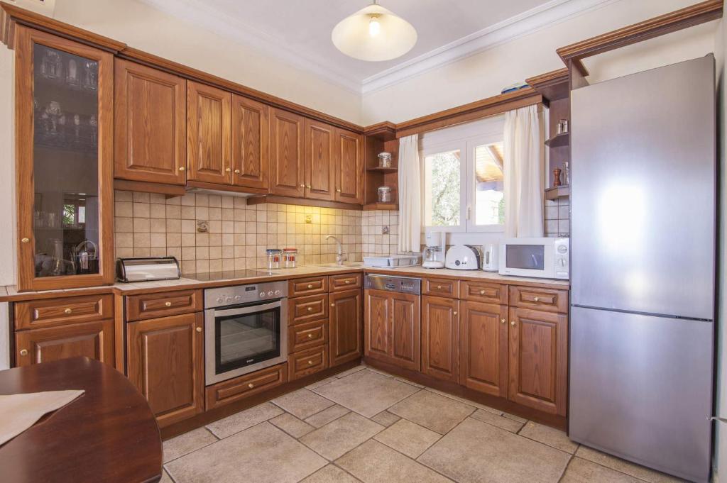 Kuchyň nebo kuchyňský kout v ubytování Villa Serpa by Villa Plus