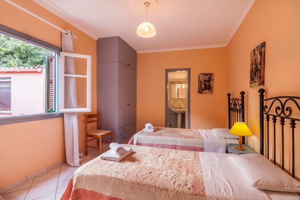 Postel nebo postele na pokoji v ubytování Villa Foula by Villa Plus