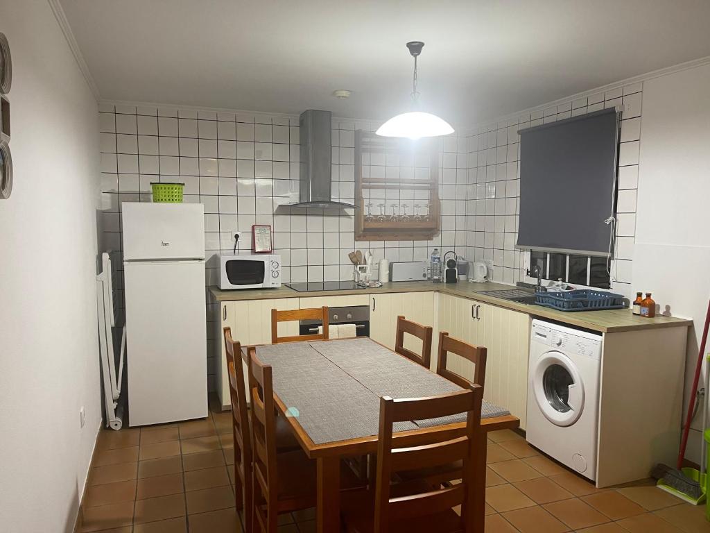 Kuchyň nebo kuchyňský kout v ubytování Casas do Verdelho