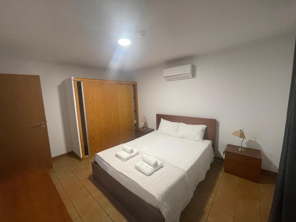 Postel nebo postele na pokoji v ubytování Casas do Verdelho