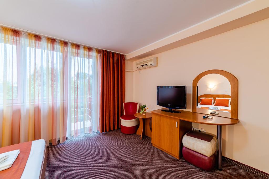 TV a/nebo společenská místnost v ubytování Hotel Giulia