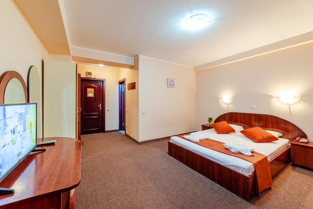 Postel nebo postele na pokoji v ubytování Hotel Giulia