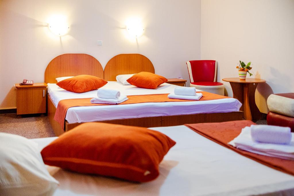 Postel nebo postele na pokoji v ubytování Hotel Giulia