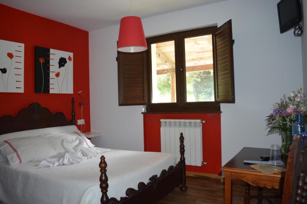 A bed or beds in a room at el calero