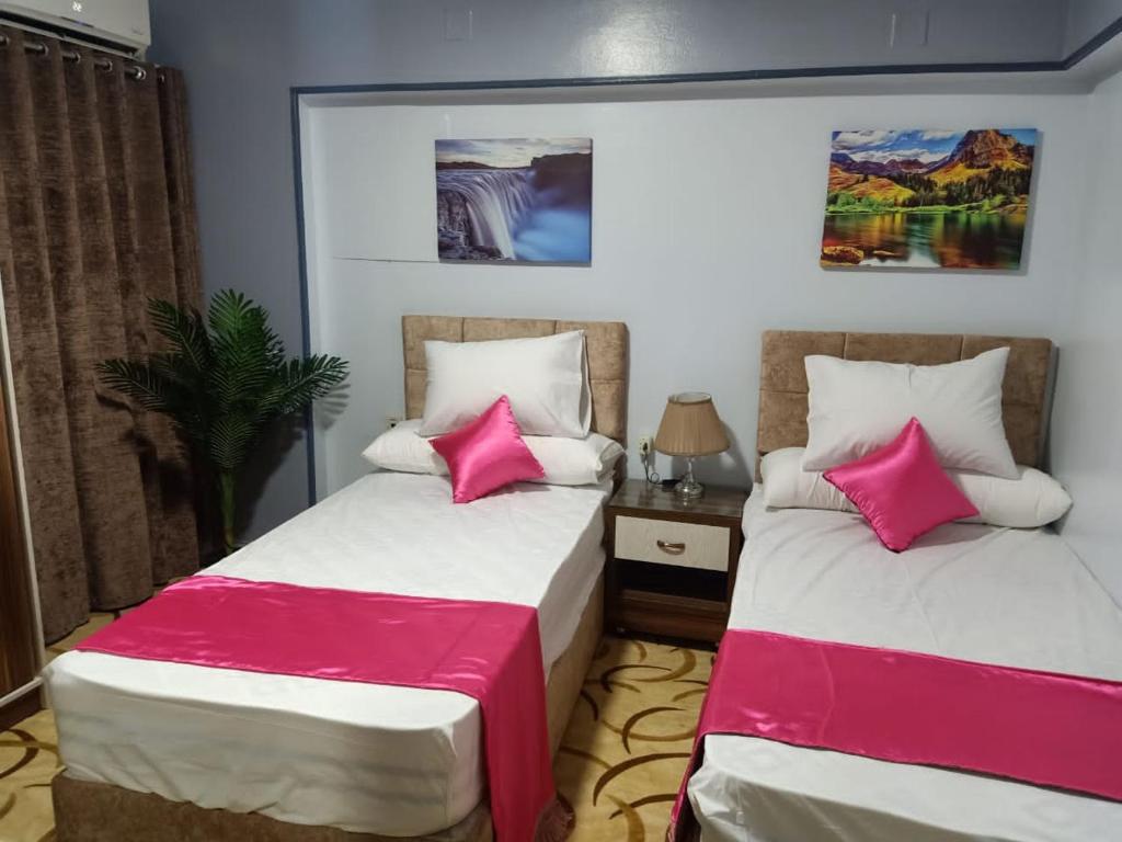 Postel nebo postele na pokoji v ubytování فاكانزا شقة فندقية مفروشة- vacanze