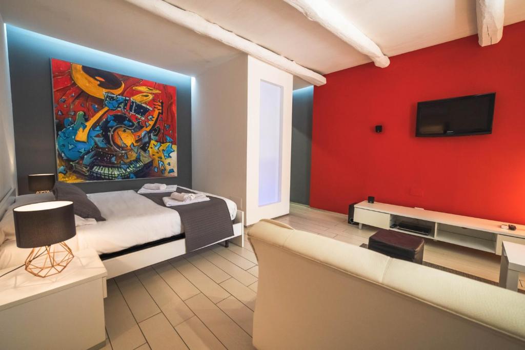 Telewizja i/lub zestaw kina domowego w obiekcie Villino Erminia - Seaside Art b&b