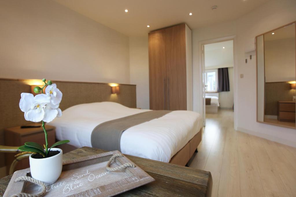Cama o camas de una habitación en Hotel Cecil