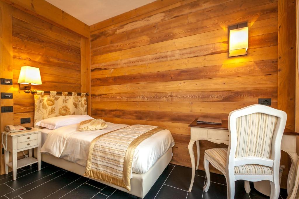 Posteľ alebo postele v izbe v ubytovaní Hotel Lo Scoiattolo