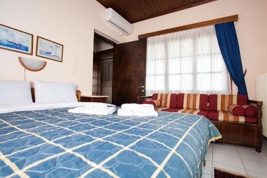 Postel nebo postele na pokoji v ubytování Militsa Guesthouse
